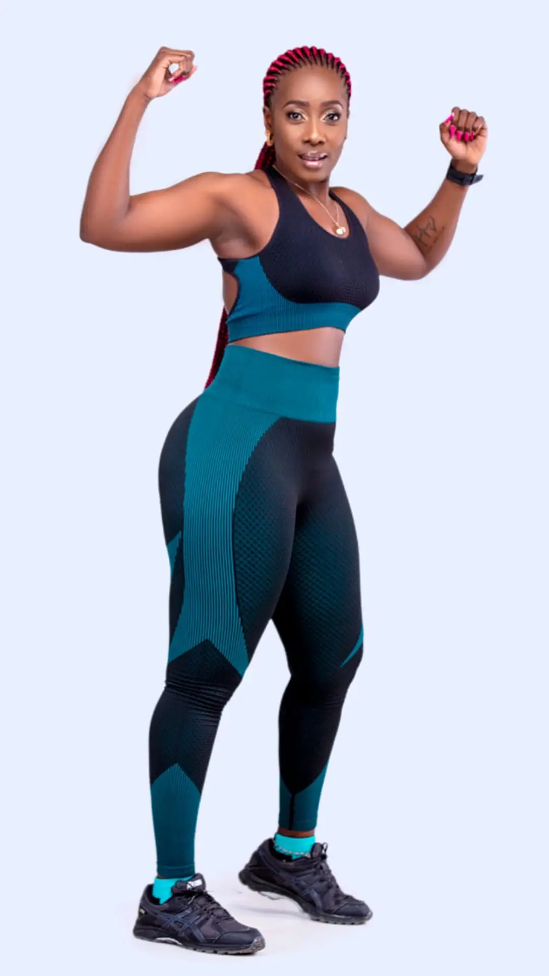 Merceline Akinyi, founder of FitThickChic, in athletic wear